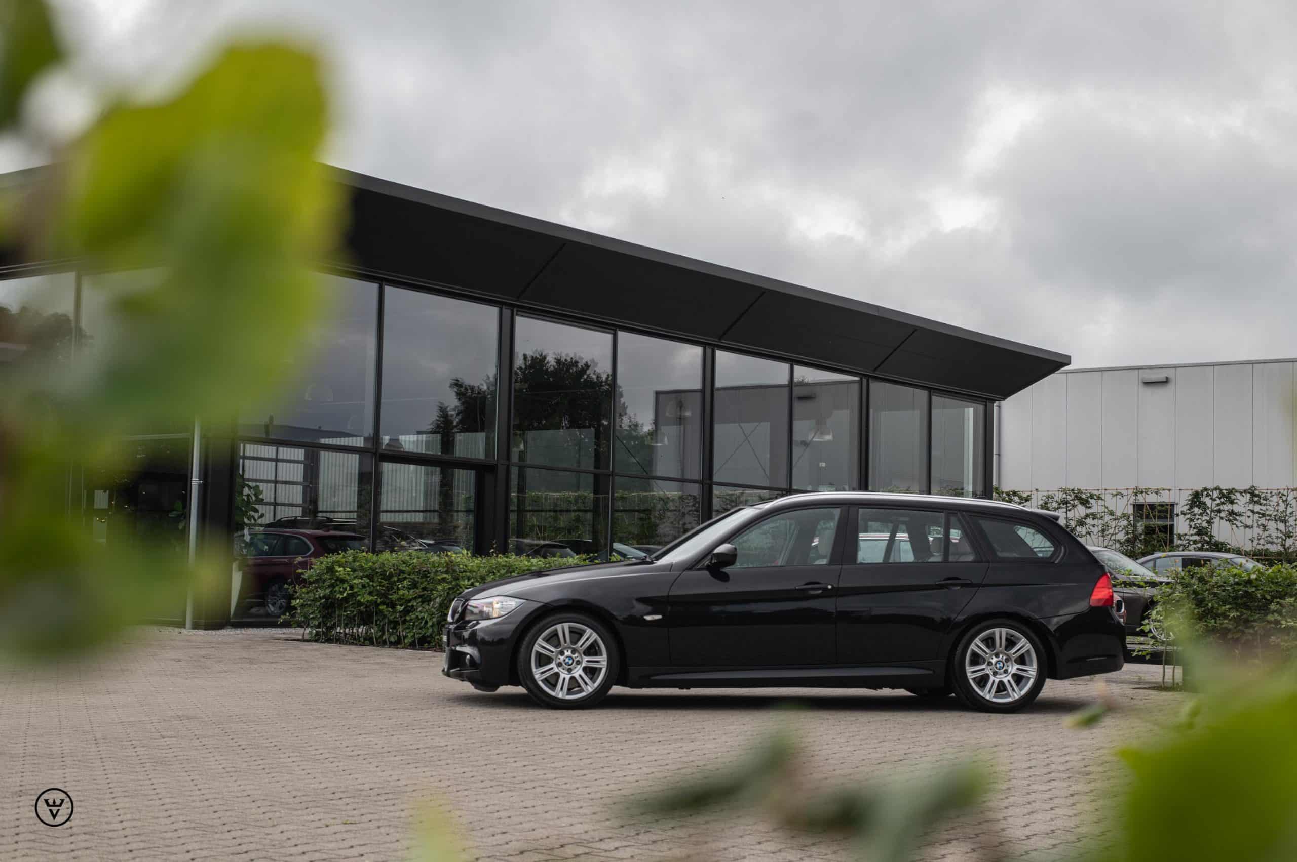 335i touring zwart